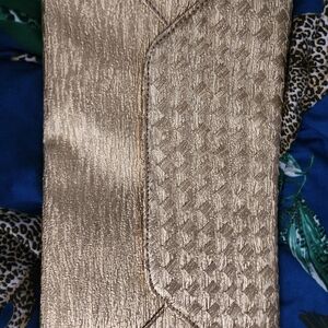 gold envelope clutch